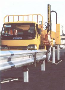 Fully automatic pile driver for guardrail posts